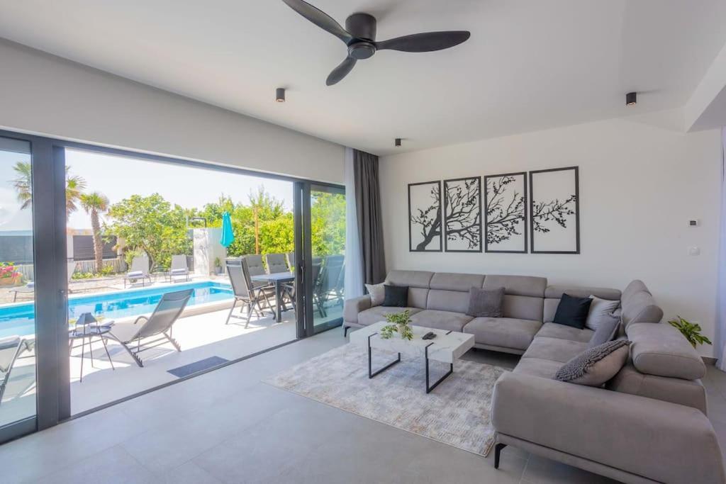 Beachfront Villa Sol&Mar With Heated Pool And Jacuzzi Kastela Exterior photo